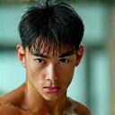 20代男性プロアスリートの躍動感あるポートレート。競技中の集中した表情